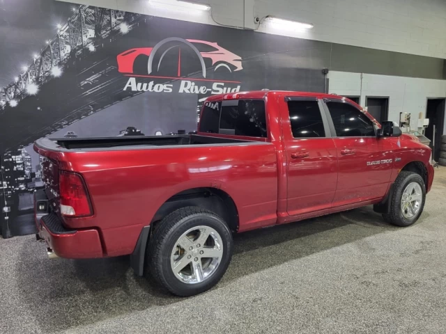 Ram 1500 4WD Quad Cab 140.5  Sport 2012