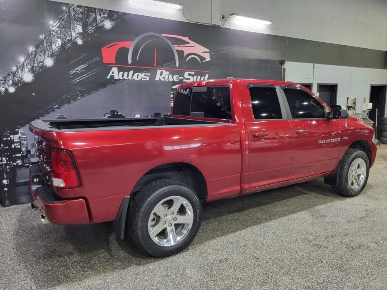 2012 Ram 1500 4WD Quad Cab 140.5  Sport Main Image