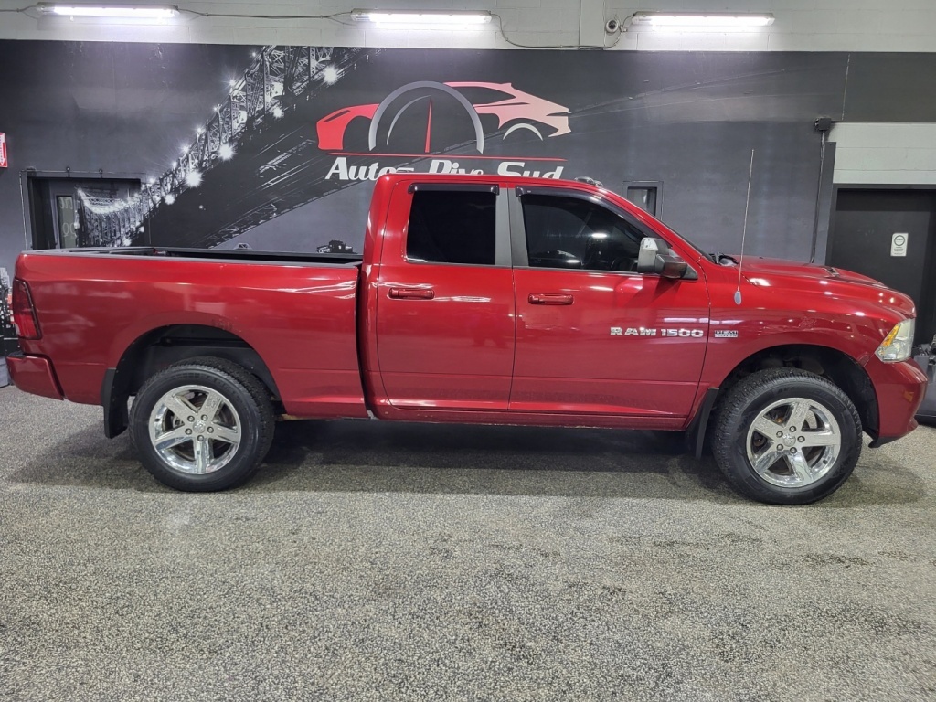 Ram 2012 1500 4WD Quad Cab 140.5  Sport